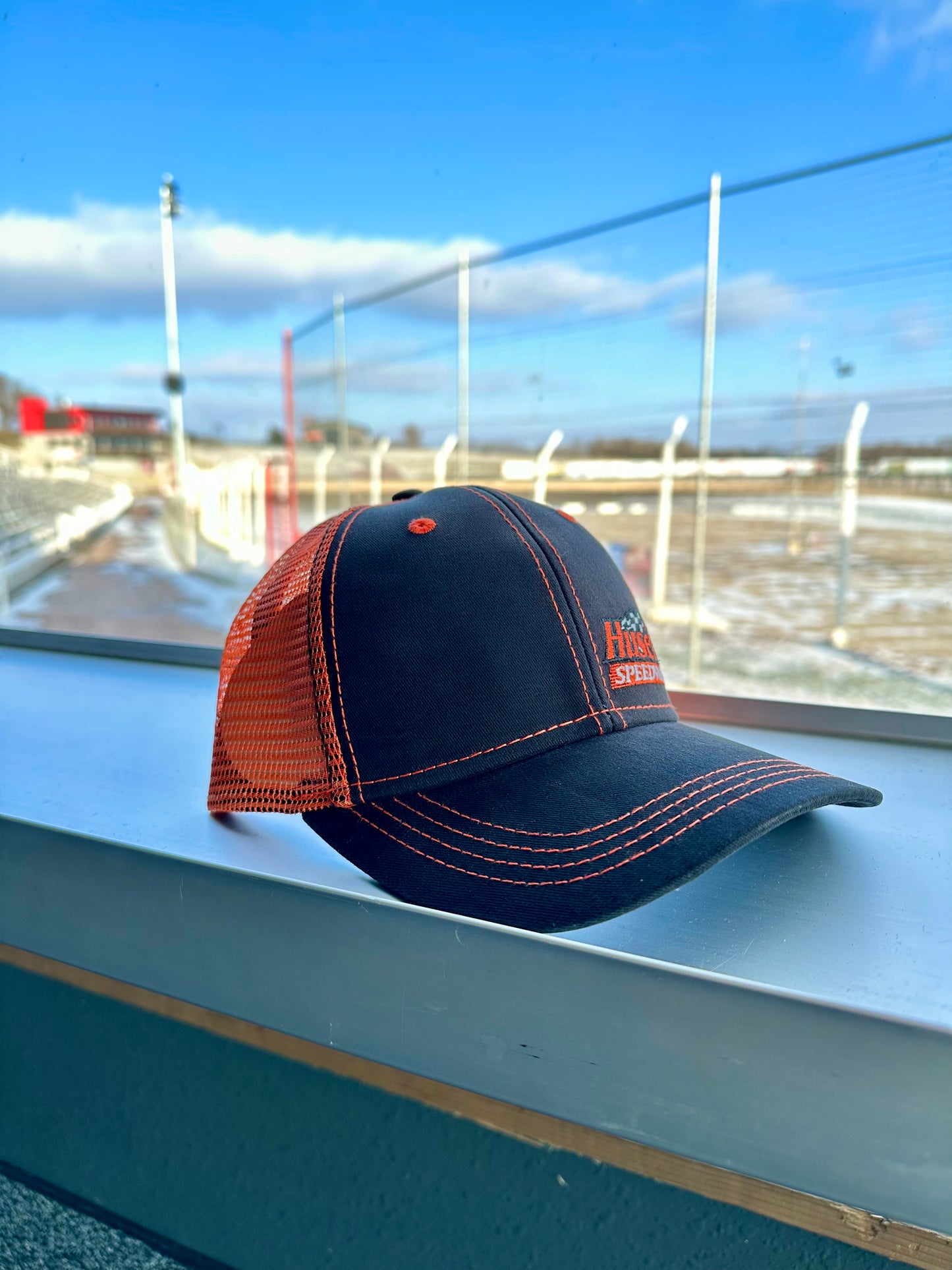 Huset's Black and Orange Trucker Hat